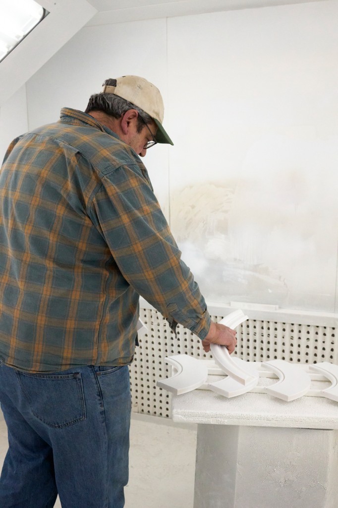 Cabinet hardware sample boards — knobs and pulls in mixed finishes