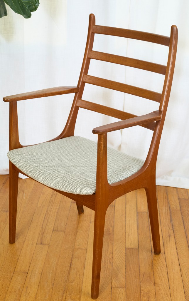 Single mid-century armchair — three-quarter view, mint seat, gallery-ready