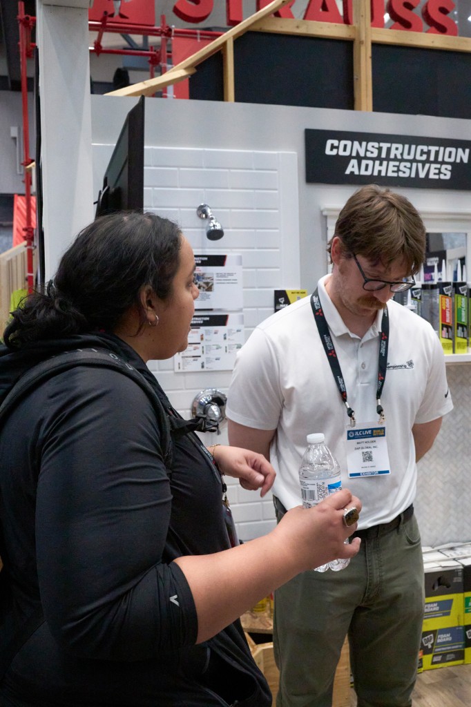 Networking at a construction adhesives display