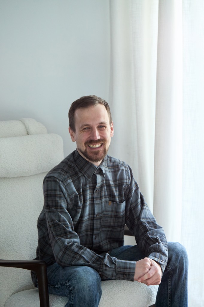 High-key lifestyle frame — calm background and connection to camera